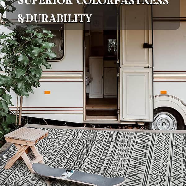 Gray 6 ft. x 9 ft. Reversible Portable Plastic Indoor/Outdoor Area Rug