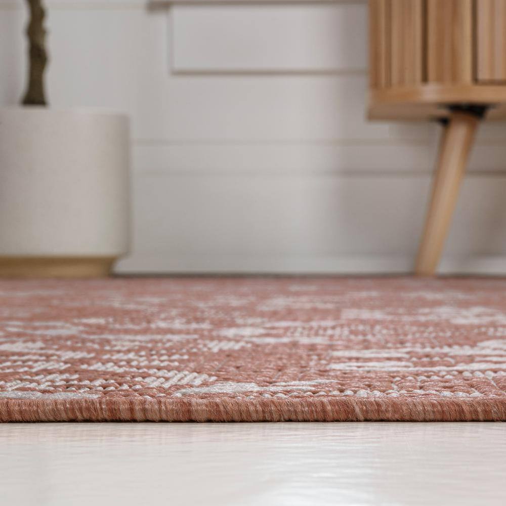 Salmon and Cream Synthetic Reversible 4' x 6' Area Rug
