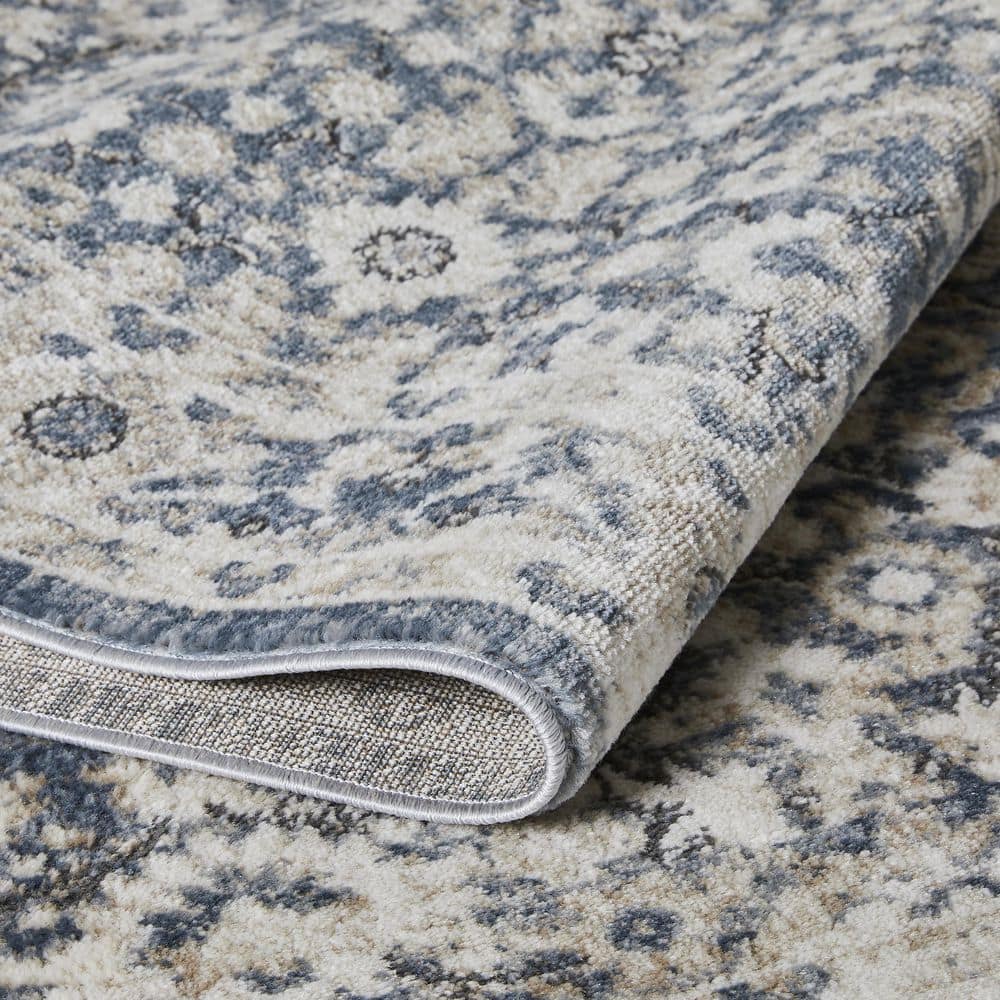 Rectangular 9' x 12' Blue Floral Synthetic Area Rug