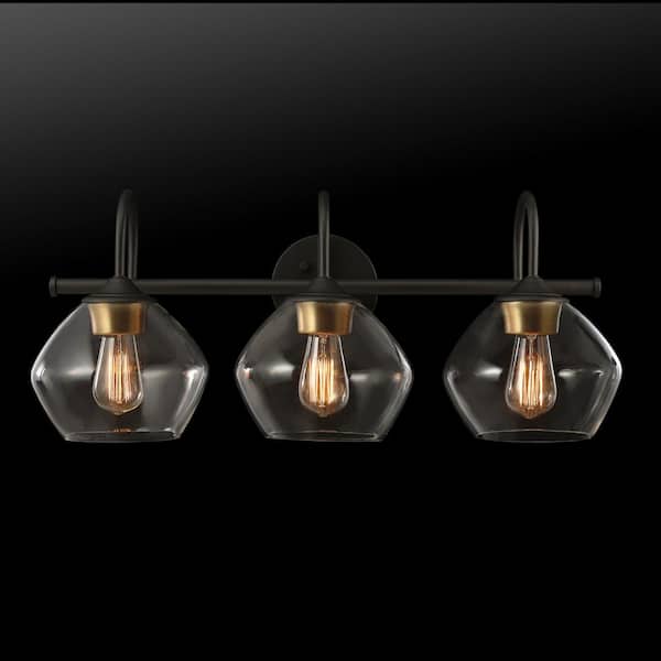 Harrow 26.3 in. 3-Light Dark Bronze Vanity Light with Antique Brass Accents and Clear Glass Shades