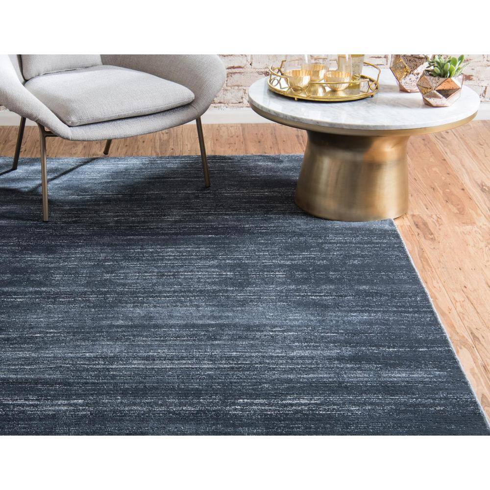 Navy Blue and Ivory 9' x 12' Easy-Care Synthetic Area Rug
