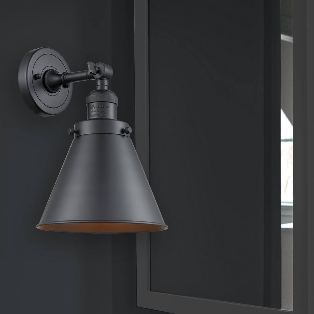 Matte Black Adjustable Metal Sconce with Brass Accents