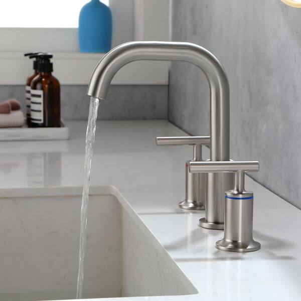 https://images.thdstatic.com/productImages/795cce1c-4873-41fb-a448-609908808cbe/svn/brushed-nickel-aurora-decor-widespread-bathroom-faucets-dbfsmdhd2b07bn-e1_600.jpg