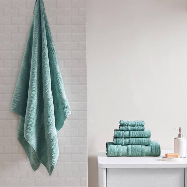 https://images.thdstatic.com/productImages/796e0c3c-373c-44f5-99c4-ef604a9c99bd/svn/teal-bath-towels-mpe73-788-c3_600.jpg