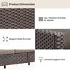 Close-up of the woven wicker texture and wide armrest detail of the sofa.
