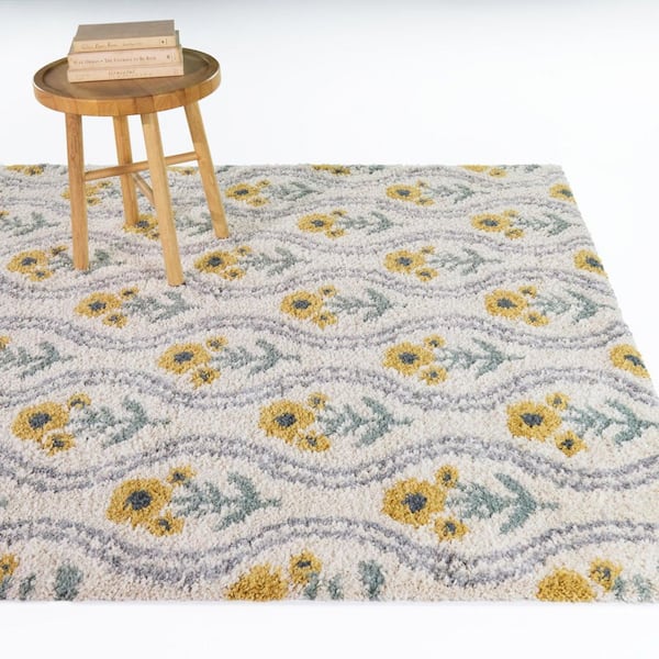 Dahlia Yellow 3 ft. 11 in. x 5 ft. 7 in. Kids Wavy Floral Area Rug
