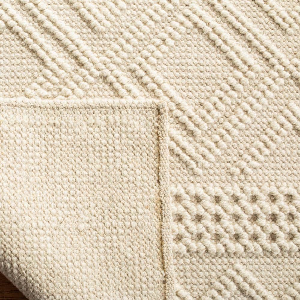 Elegant Ivory 9' x 12' Hand-Knotted Wool Area Rug