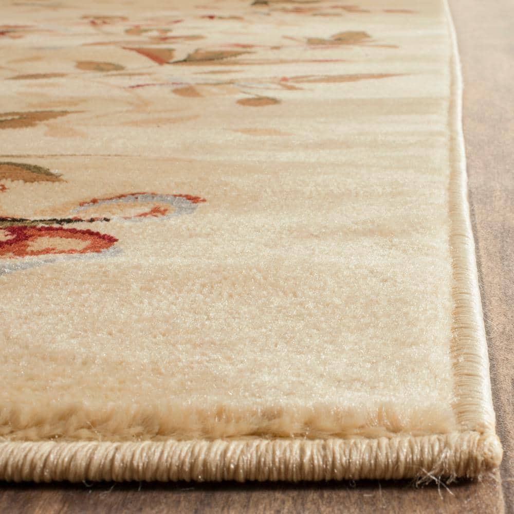 Beige and Red Floral 9' x 12' Synthetic Area Rug