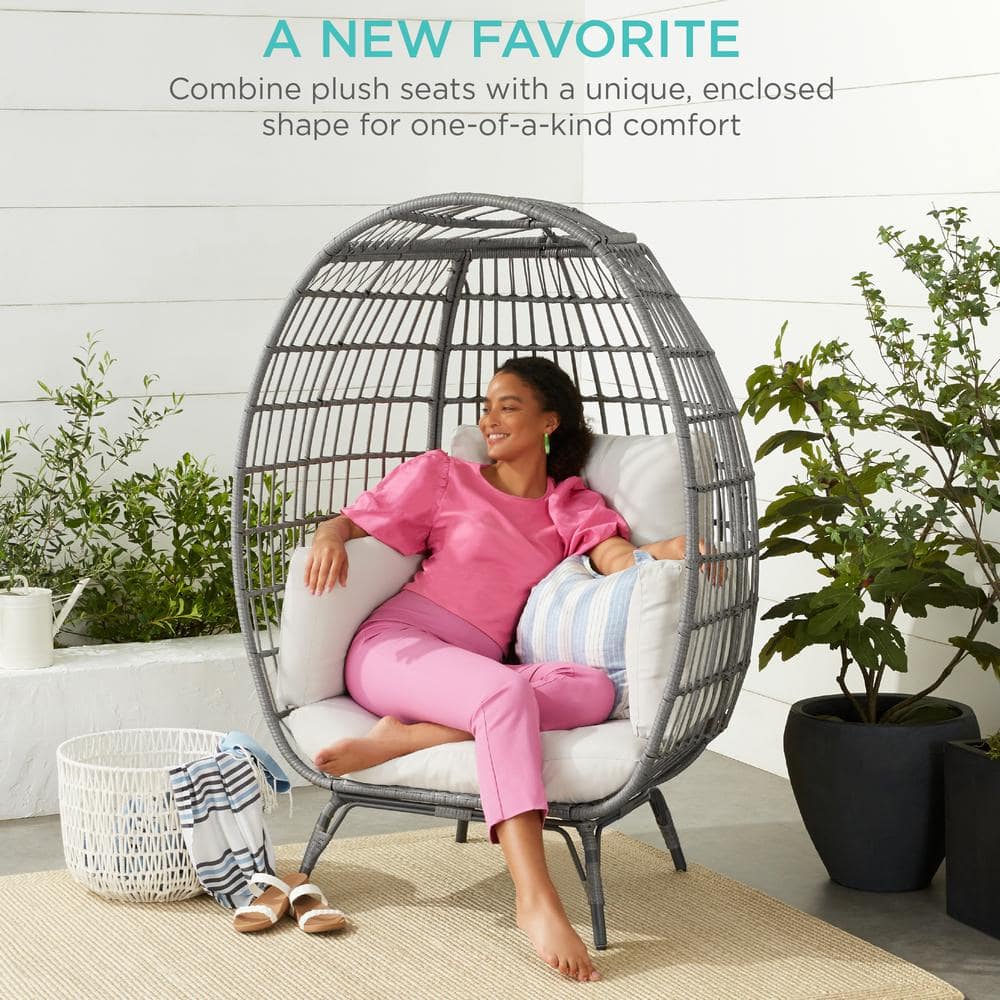 Gray Wicker Egg Lounge Chair with White Sand Cushions