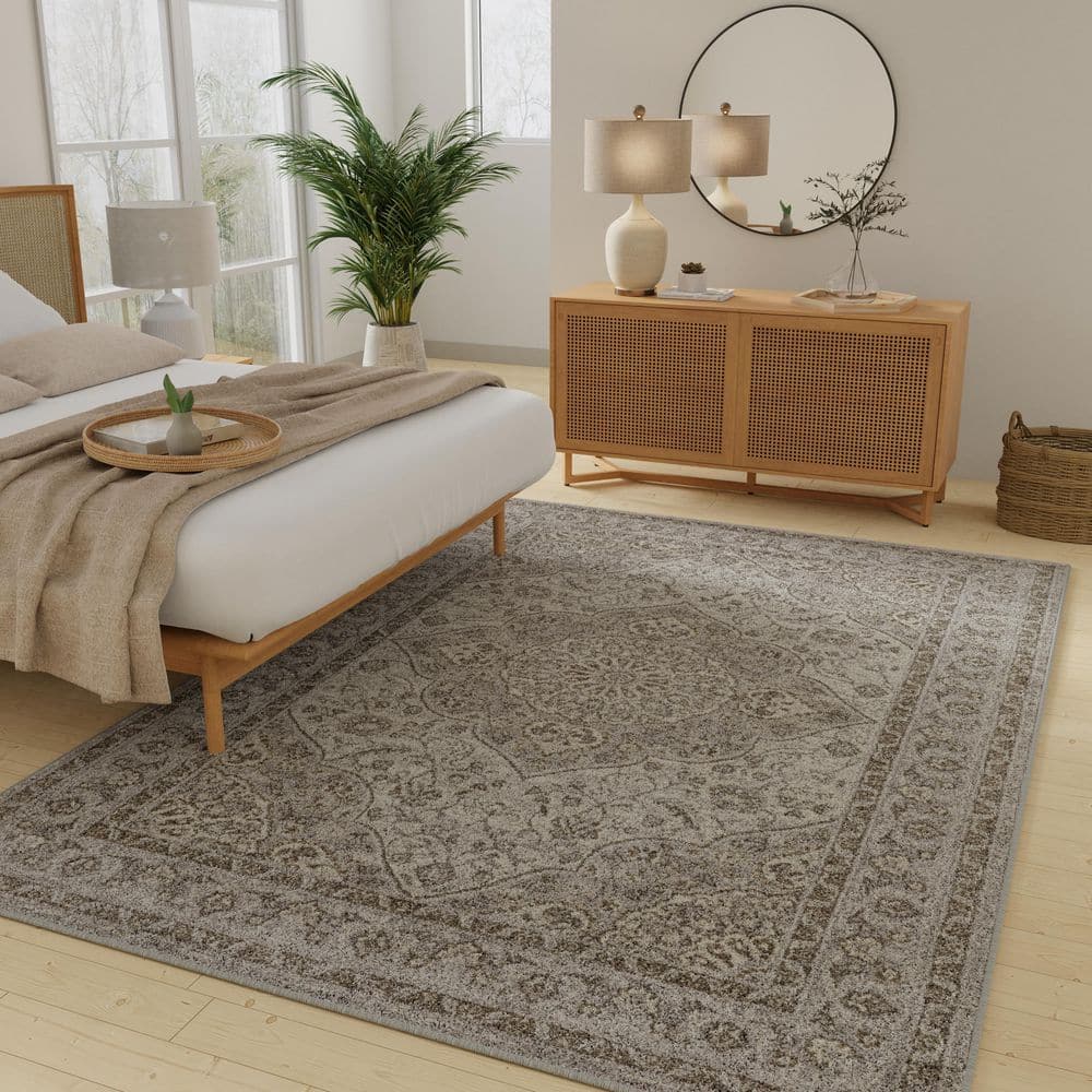 Gray and Beige 4' x 6' Oriental Synthetic Area Rug