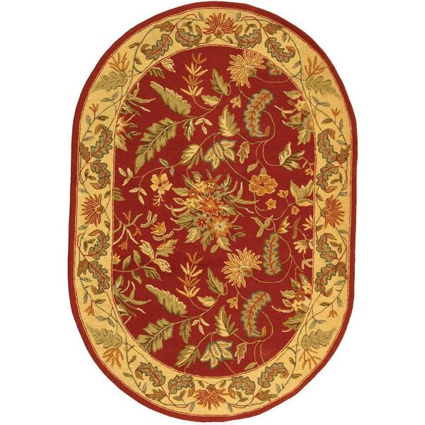 SAFAVIEH Chelsea Red 5 ft. x 7 ft. Oval Border Area Rug