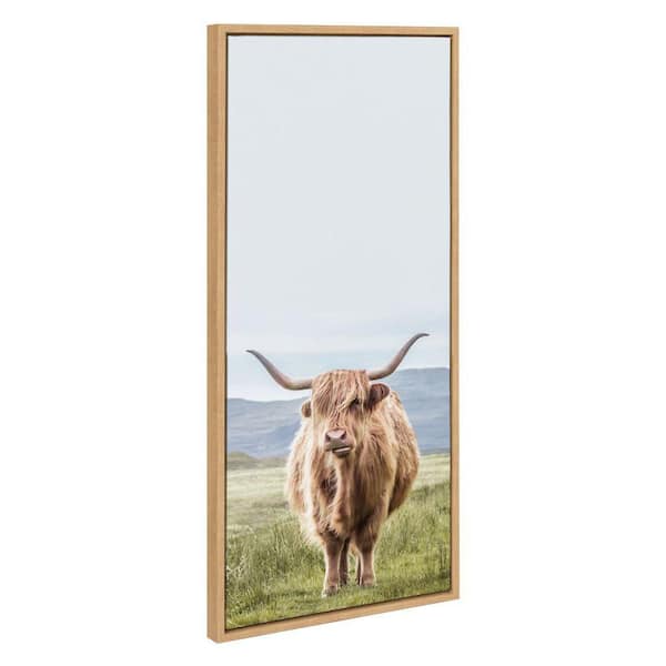 Kate and Laurel Sylvie Highland Cow Mountain Landscape by The Creative Bunch Studio Framed Art Print 18 in. x 40 in.