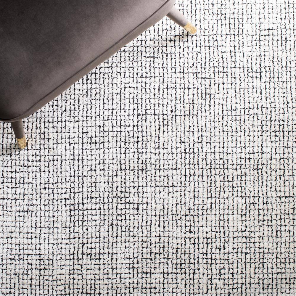 Ivory Abstract Hand-Tufted Wool & Viscose 2' x 3' Accent Rug
