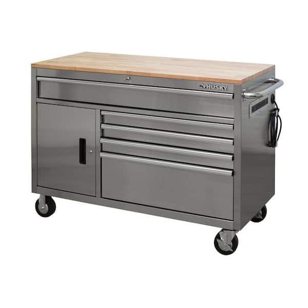 https://images.thdstatic.com/productImages/79f86a4b-77c6-4f08-a6c7-f9082e3db371/svn/stainless-steel-with-silver-trim-husky-mobile-workbenches-hotc5205jx2m-64_600.jpg