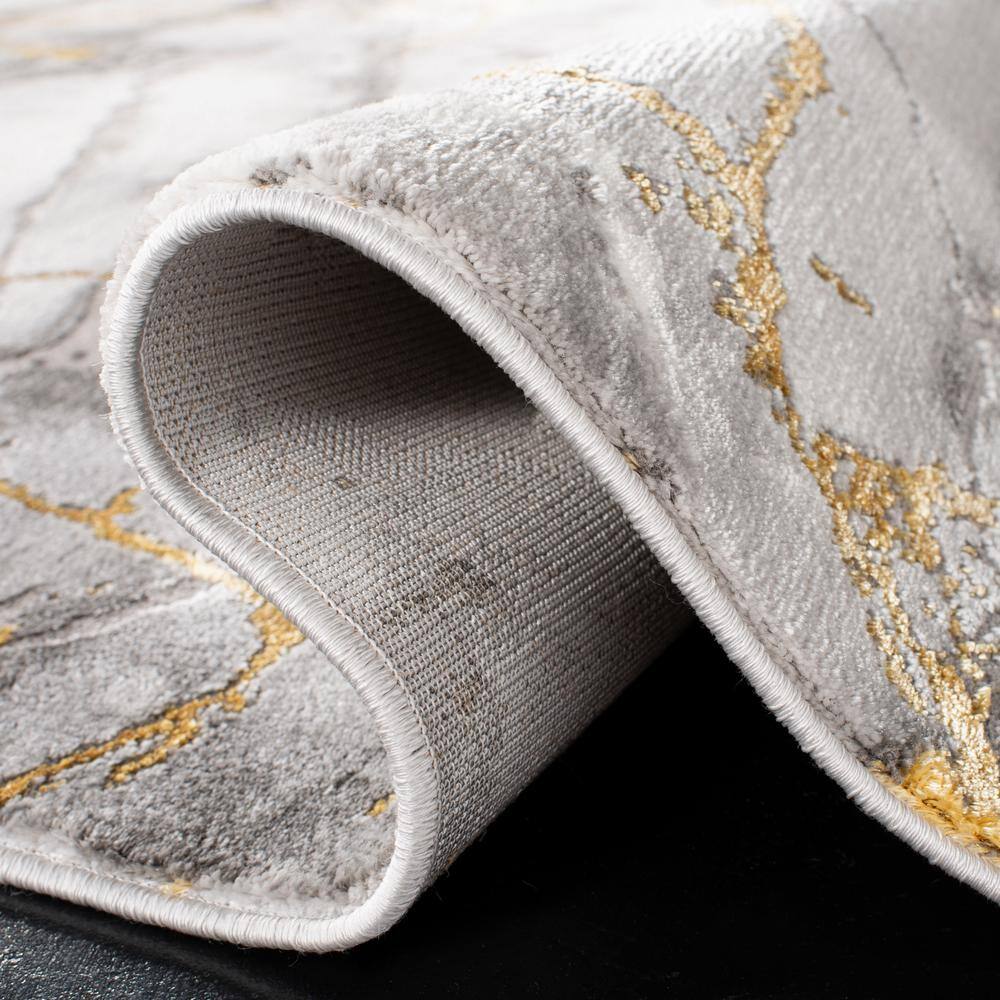 Elegant Abstract Gray and Gold 2' x 8' Synthetic Runner Rug
