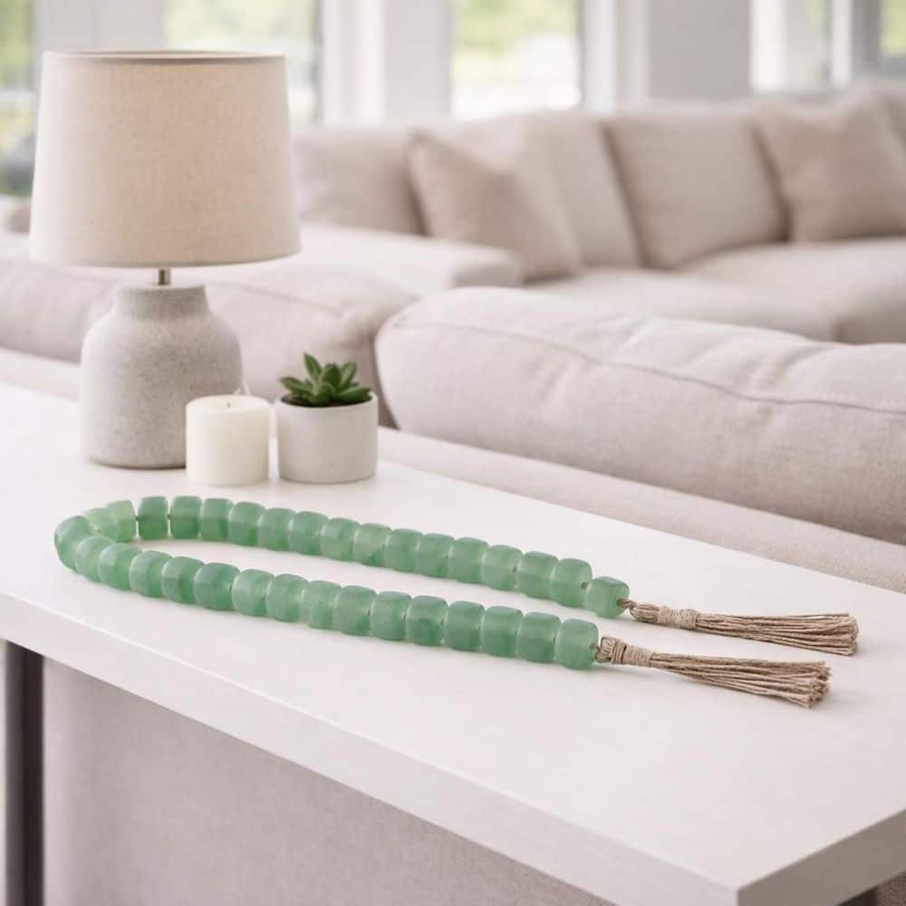 Green 38 in. x 1.25 in. Resin Jute Beaded Garland with Tassel Accents