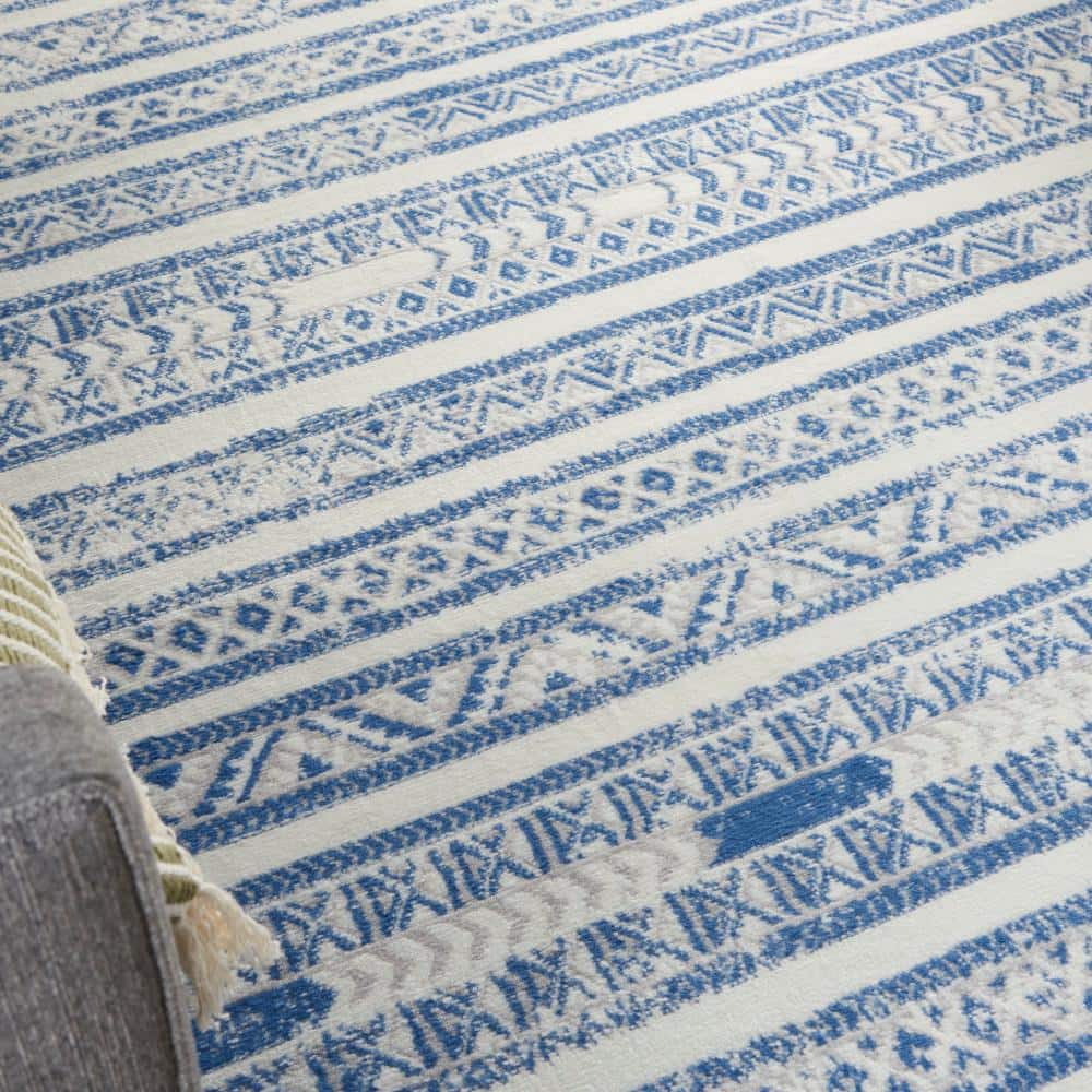 Ivory Blue Geometric Synthetic 6' x 9' Easy-Care Area Rug