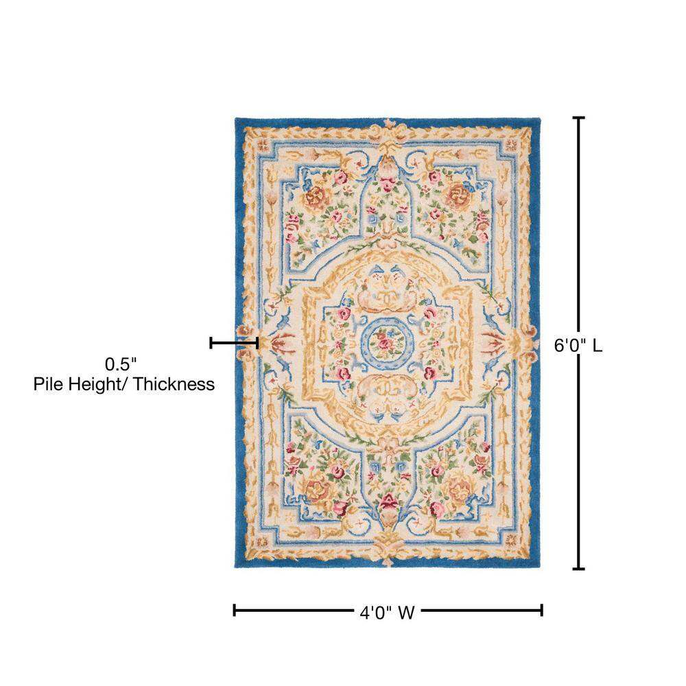 Handmade Blue and Ivory Wool 4' x 6' Tufted Area Rug