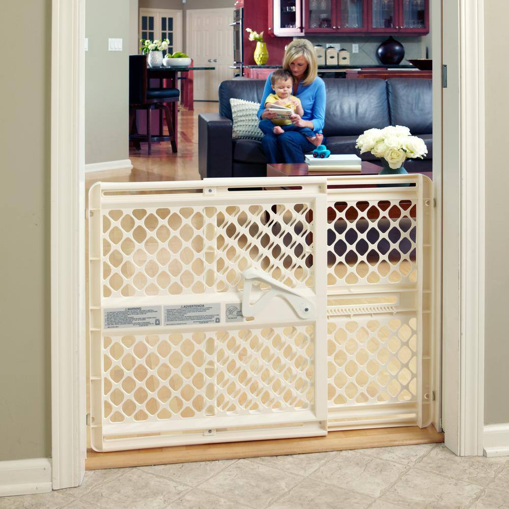 https://images.thdstatic.com/productImages/7a1e3002-ccd7-47e2-a370-58c039e0dc57/svn/toddleroo-by-north-states-baby-gates-8629-1d_1000.jpg