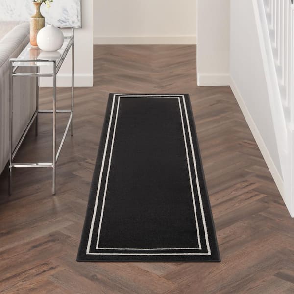 Nourison Essentials Black Ivory 2 ft. x 6 ft. Solid Contemporary Runner Area Rug