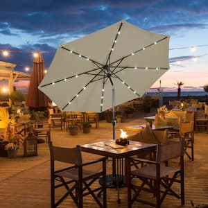 10 ft. Iron Market Solar Tilt Patio Umbrella in Tan with LED Lights