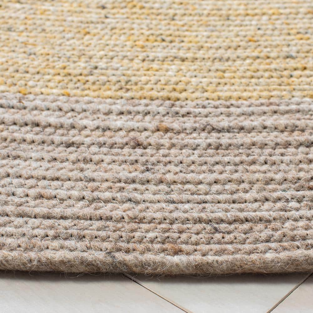 Handmade Gold and Beige Round Wool Braided Rug