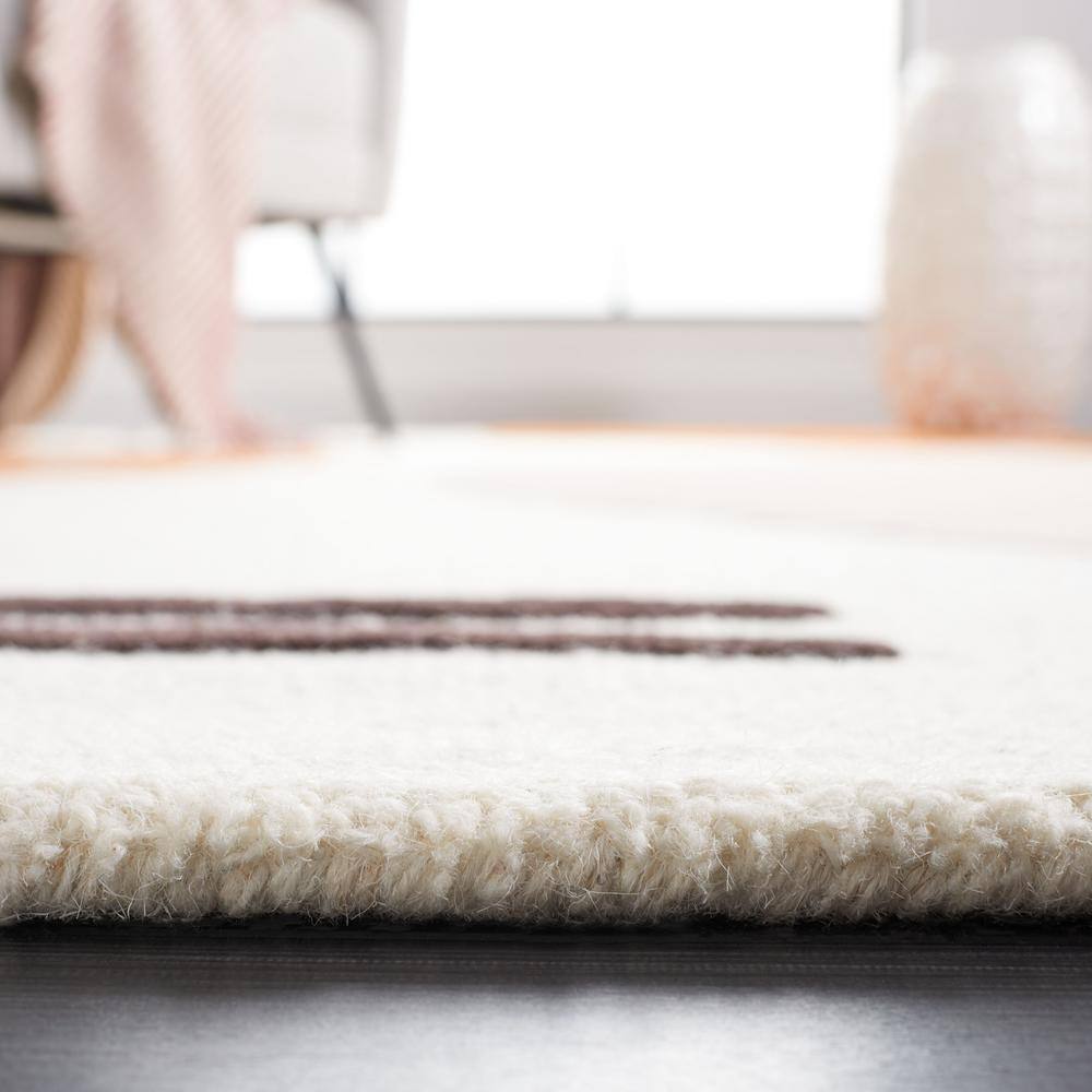 Ivory and Rust Hand-Tufted Wool 6' x 9' Area Rug