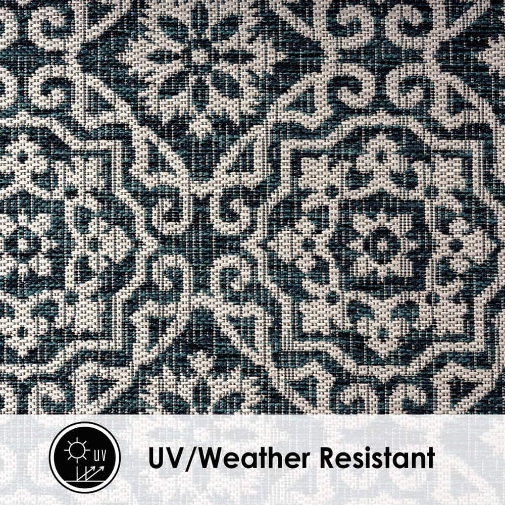 Navy Blue and Ivory Geometric Synthetic Indoor/Outdoor Rug