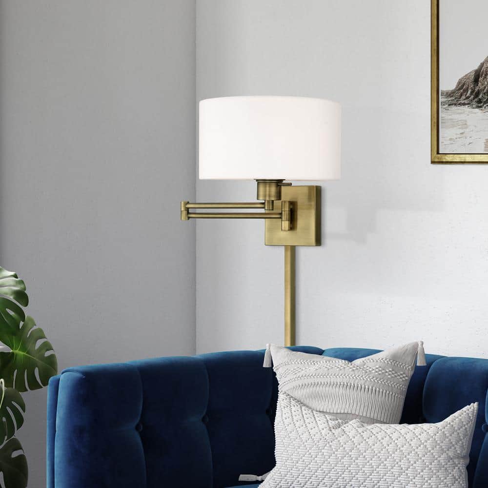 Antique Brass Swing Arm Wall Lamp with Off-White Fabric Shade