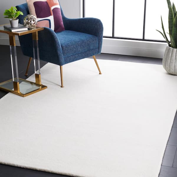 Fifth Avenue 10 ft. x 14 ft. Ivory Solid Area Rug