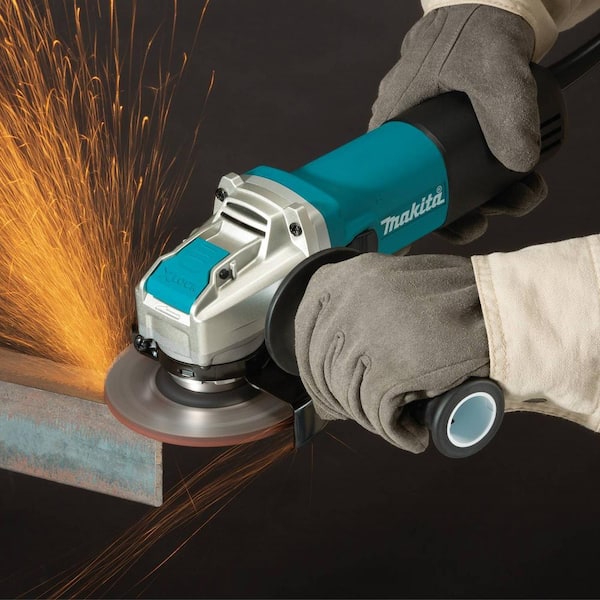 Makita 15 Amp 7 in. Corded Angle Grinder with Grinding wheel, Side handle  and Wheel Guard GA7021 - The Home Depot