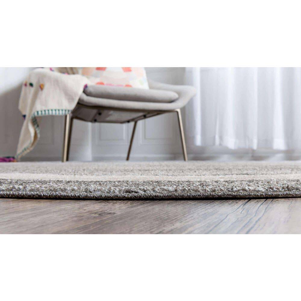 Gray and Ivory Round Tufted Synthetic Rug, 8'