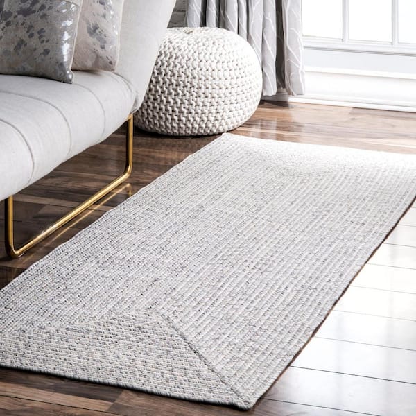https://images.thdstatic.com/productImages/7b01a472-1595-4af3-aecd-475ae8f01563/svn/ivory-nuloom-outdoor-rugs-hjfv01e-2608-e1_600.jpg