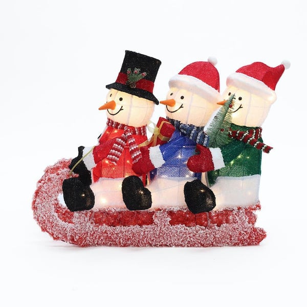 LuxenHome 29 in. Lighted Snowman Family on Sled in Winter Coats