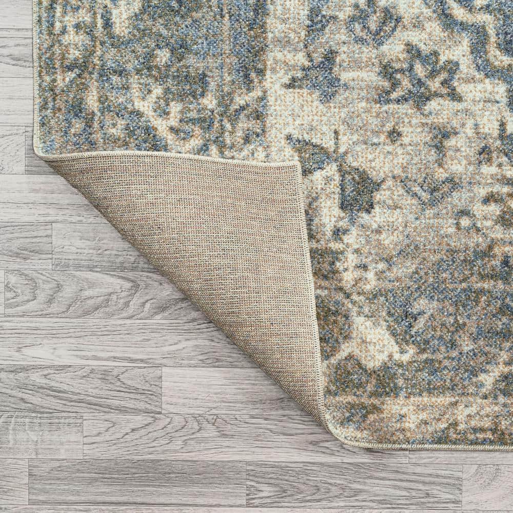 Pavel Distressed Blue and Cream Synthetic Medallion Washable Area Rug 5'3" x 7'7"