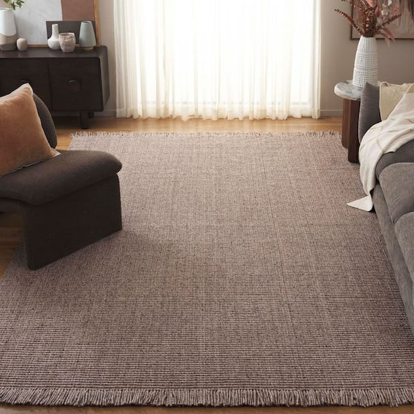 Natural Fiber 8 ft. x 10 ft. Beige Woven Solid Fringe Area Rug