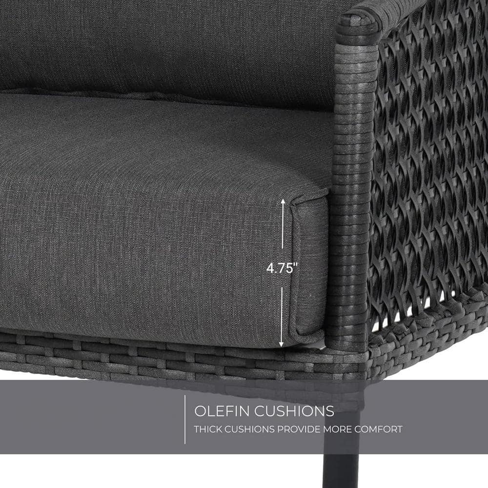 Close-up of the thick grey olefin cushion on the wicker chair.