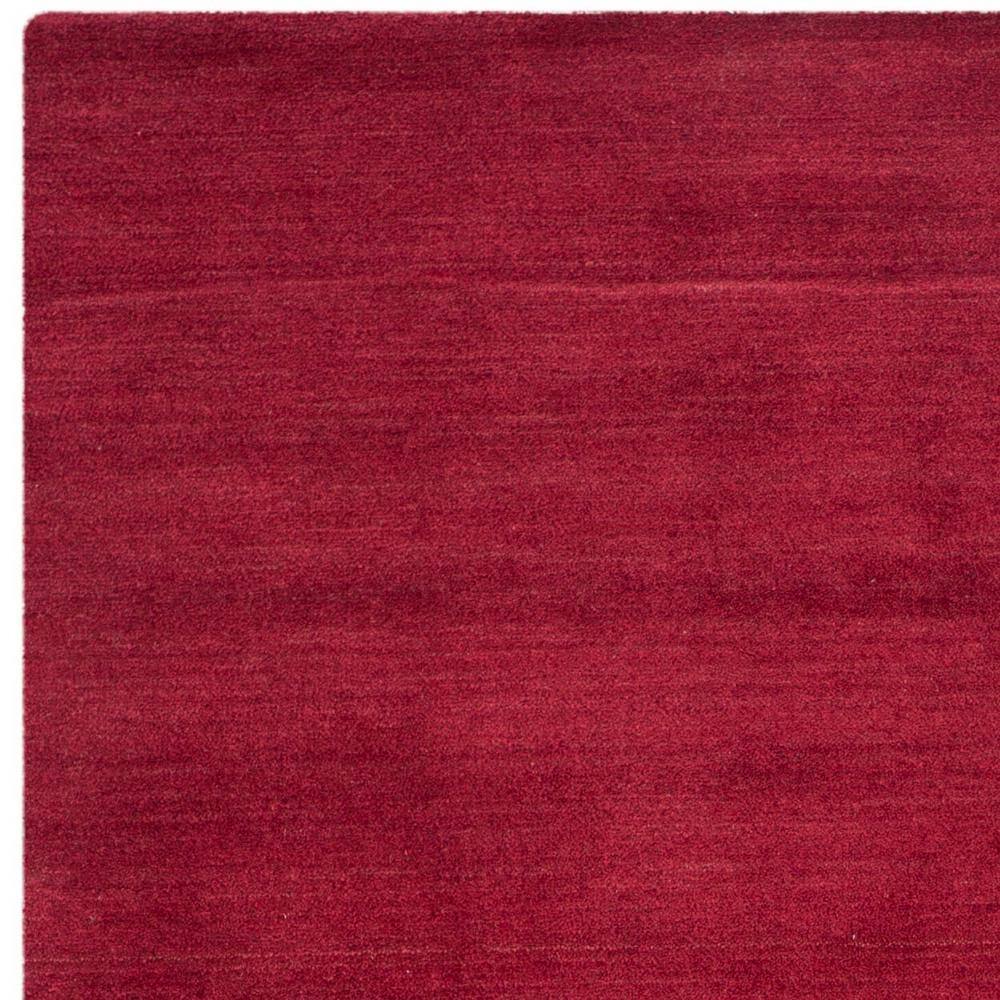 Himalaya Red Handmade Wool 6' x 9' Area Rug