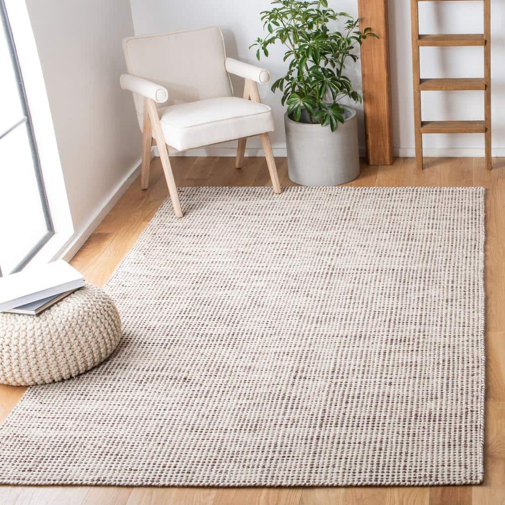 Ivory Hand Tufted Wool Rectangular Area Rug 6' x 9'