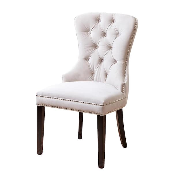 white tufted dining chairs