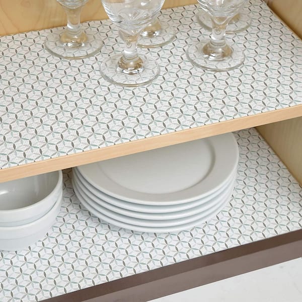https://images.thdstatic.com/productImages/7b98b8b9-ac33-4408-aafb-43a6aaf1bfca/svn/brown-beige-white-gray-and-mint-con-tact-shelf-liners-drawer-liners-04f-c7hn1-06-31_600.jpg