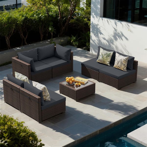 7-Piece Wicker Sectional Seating Group with Dark gray cushions