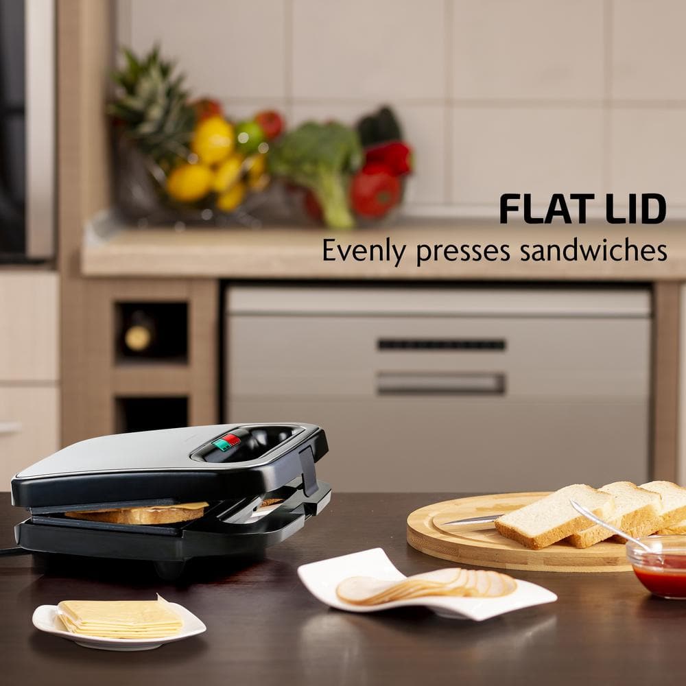https://images.thdstatic.com/productImages/7ba3a12a-453c-4b56-a09e-faa63e210e5c/svn/black-ovente-panini-presses-gps401b-4f_1000.jpg