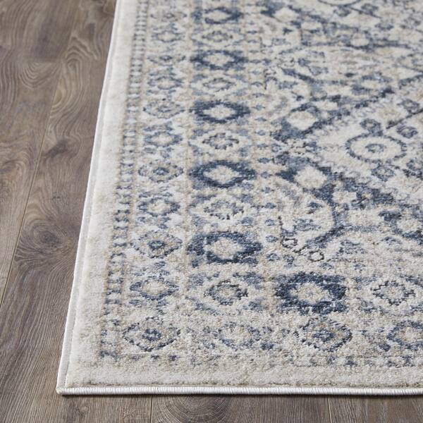 Kehleigh Avnorie Blue 5 ft. 3 in. x 7 ft. 3 in. Oriental Polypropylene Indoor Area Rug