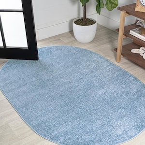 Haze Solid Low-Pile Classic Blue 5 ft. x 8 ft. Oval Area Rug