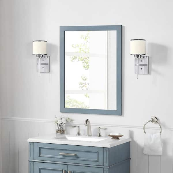 https://images.thdstatic.com/productImages/7bbe0d6d-2aff-419c-8207-95a02250e7d3/svn/antique-manhattan-blue-home-decorators-collection-vanity-mirrors-highgate-mr-amb-44_600.jpg