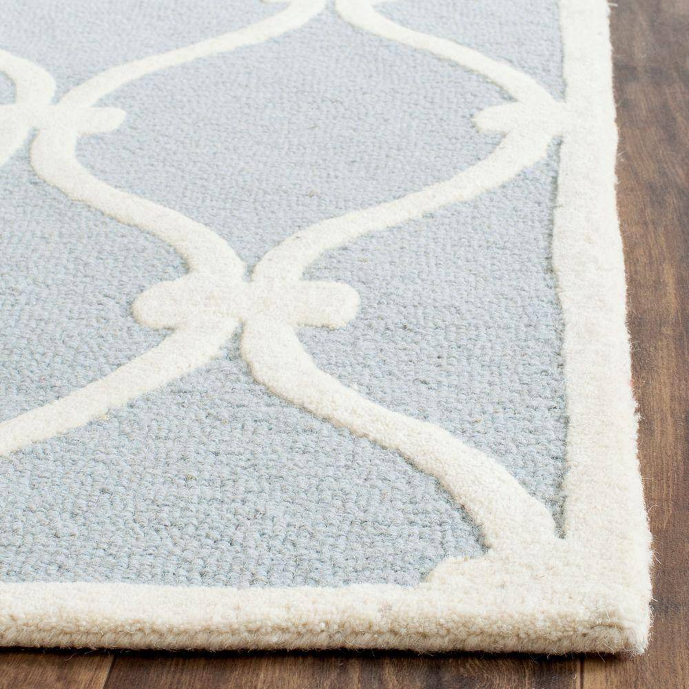 Hand-Tufted Blue and Ivory Wool Geometric Area Rug, 2' x 3'