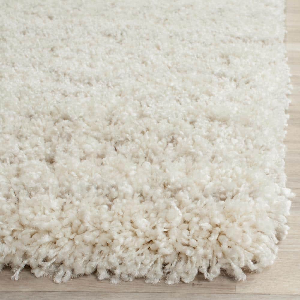Sahara Bliss Ivory & Beige Hand-Knotted Shag Area Rug - 8' x 10'