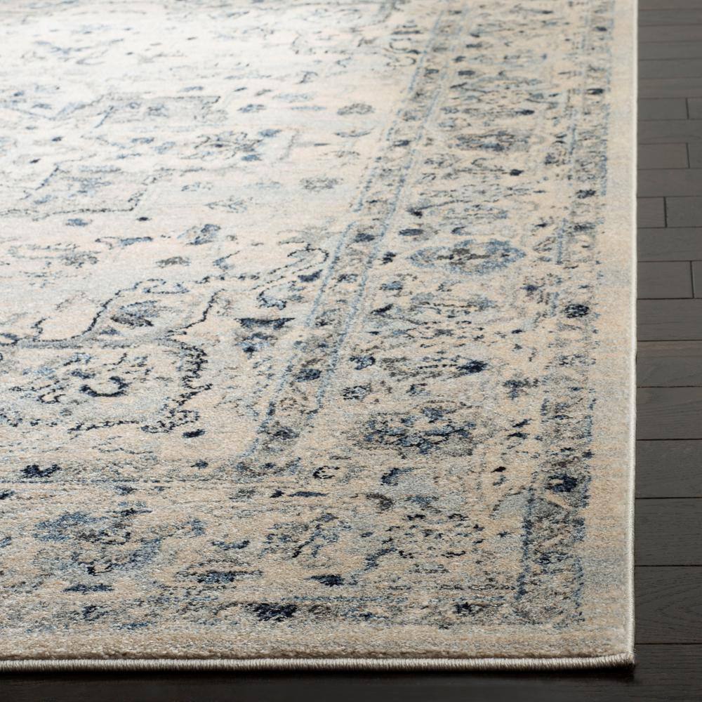 Charleston Ivory and Light Blue Synthetic Reversible Area Rug