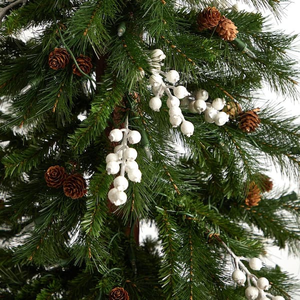 White Christmas Decorations And Popcorn Garland On Fir Tree